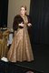 Danielle Cantrell modeling a gold brocade dress with a mink from the 1950s..jpg